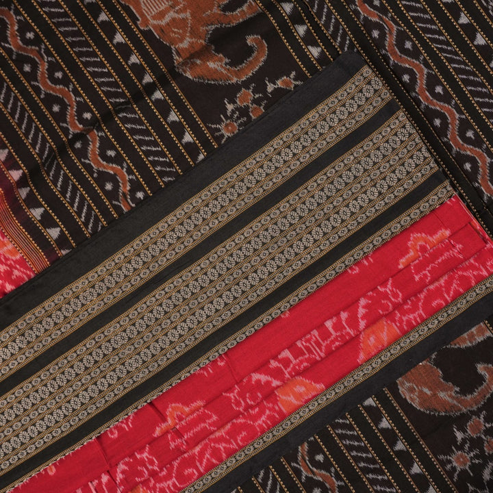 Flat layout view of the red and black Sambalpuri cotton saree showing the body, border, and pallu.