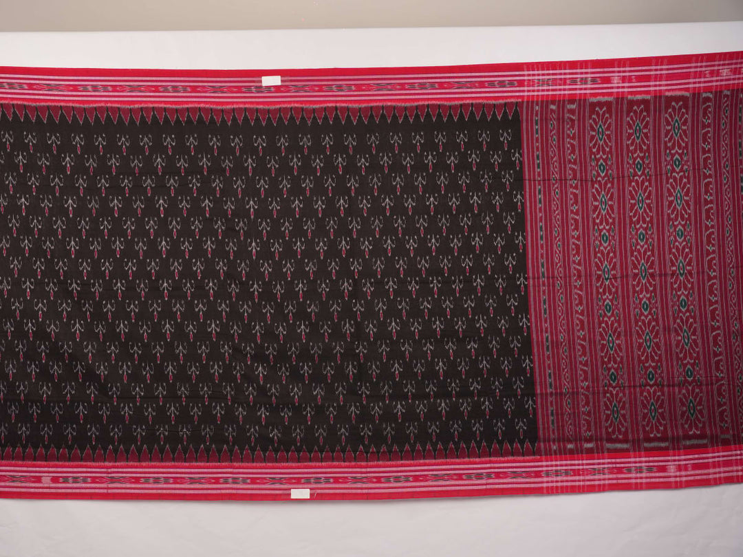 Model draped in a black and red Sambalpuri cotton saree showing traditional Odisha handloom styling.