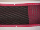 Model draped in a black and red Sambalpuri cotton saree showing traditional Odisha handloom styling.