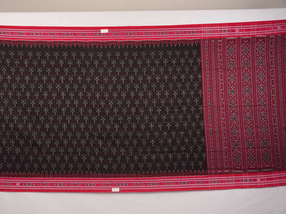 Model draped in a black and red Sambalpuri cotton saree showing traditional Odisha handloom styling.