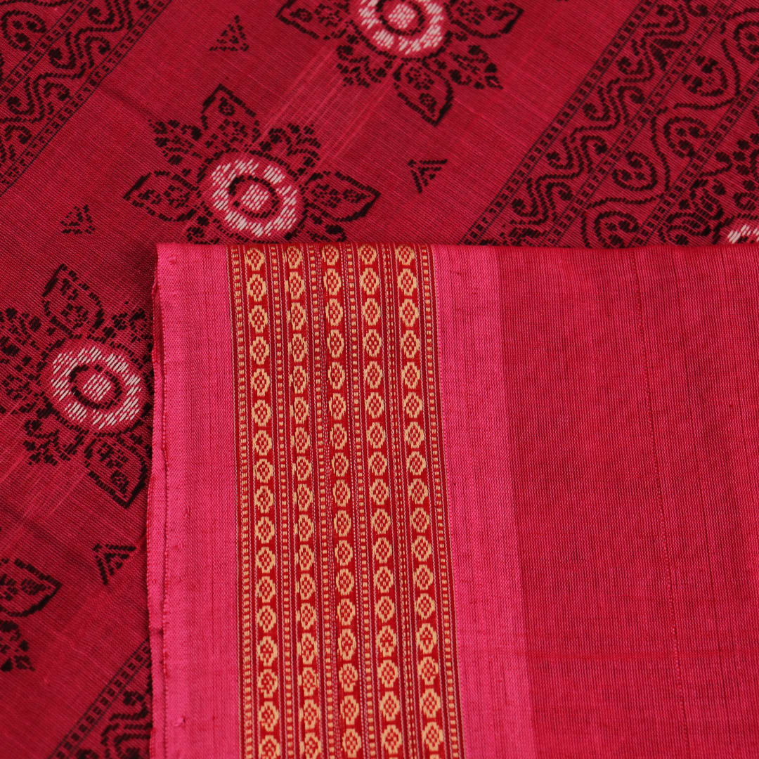 Full view of a maroon and pink cotton Bomkai saree featuring a butta pattern.