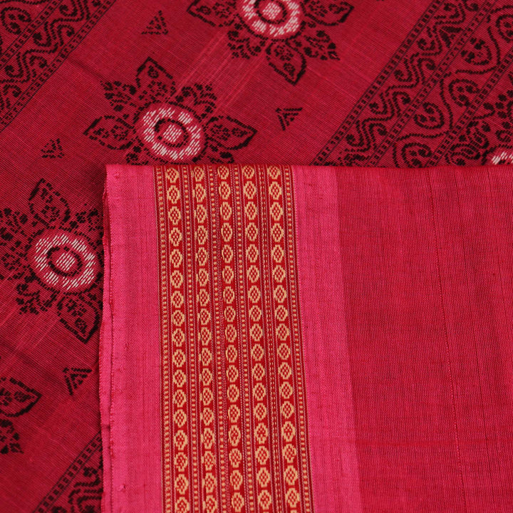 Full view of a maroon and pink cotton Bomkai saree featuring a butta pattern.