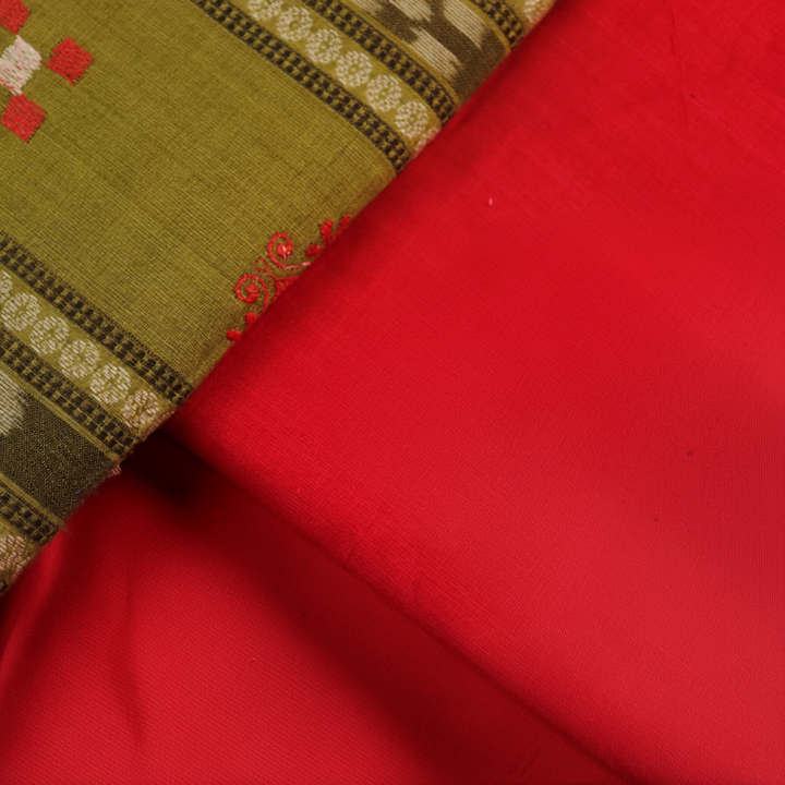 Sambalpuri cotton dress material's green and red motif blouse piece detail.