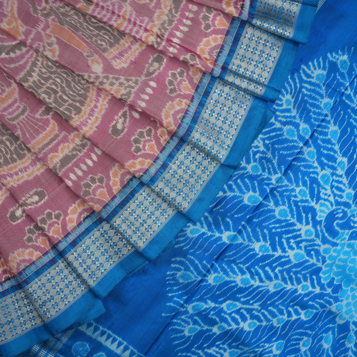 Close-up of the multi-color blue Sambalpuri silk saree fabric texture, highlighting intricate weave.