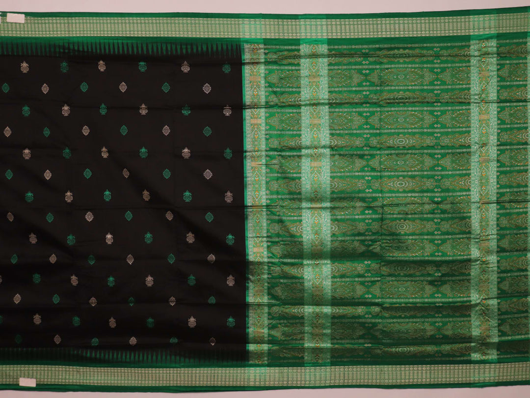 Close-up view of black silk Bomkai saree, showcasing intricate butta patterns and green accents