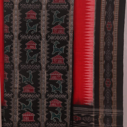Detail of the black Sambalpuri cotton dress material's blouse piece with red motifs.