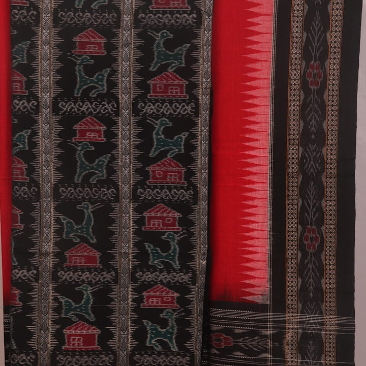 Detail of the black Sambalpuri cotton dress material's blouse piece with red motifs.