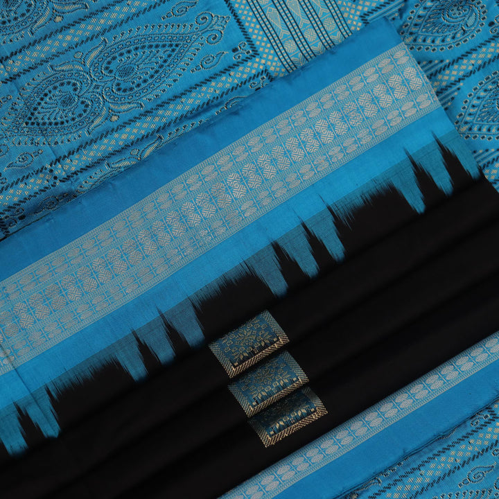 Close-up of Intricate Bomkai Silk Saree Fabric Texture in Black and Blue with Butta Pattern