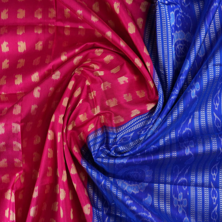 Close-up of Sambalpuri silk fabric texture, revealing the fine handloom weave and quality.
