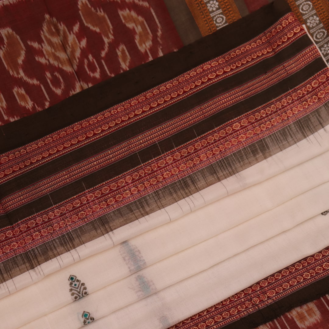 Full view of an elegant white cotton Bomkai handloom saree featuring a brown butta pattern.