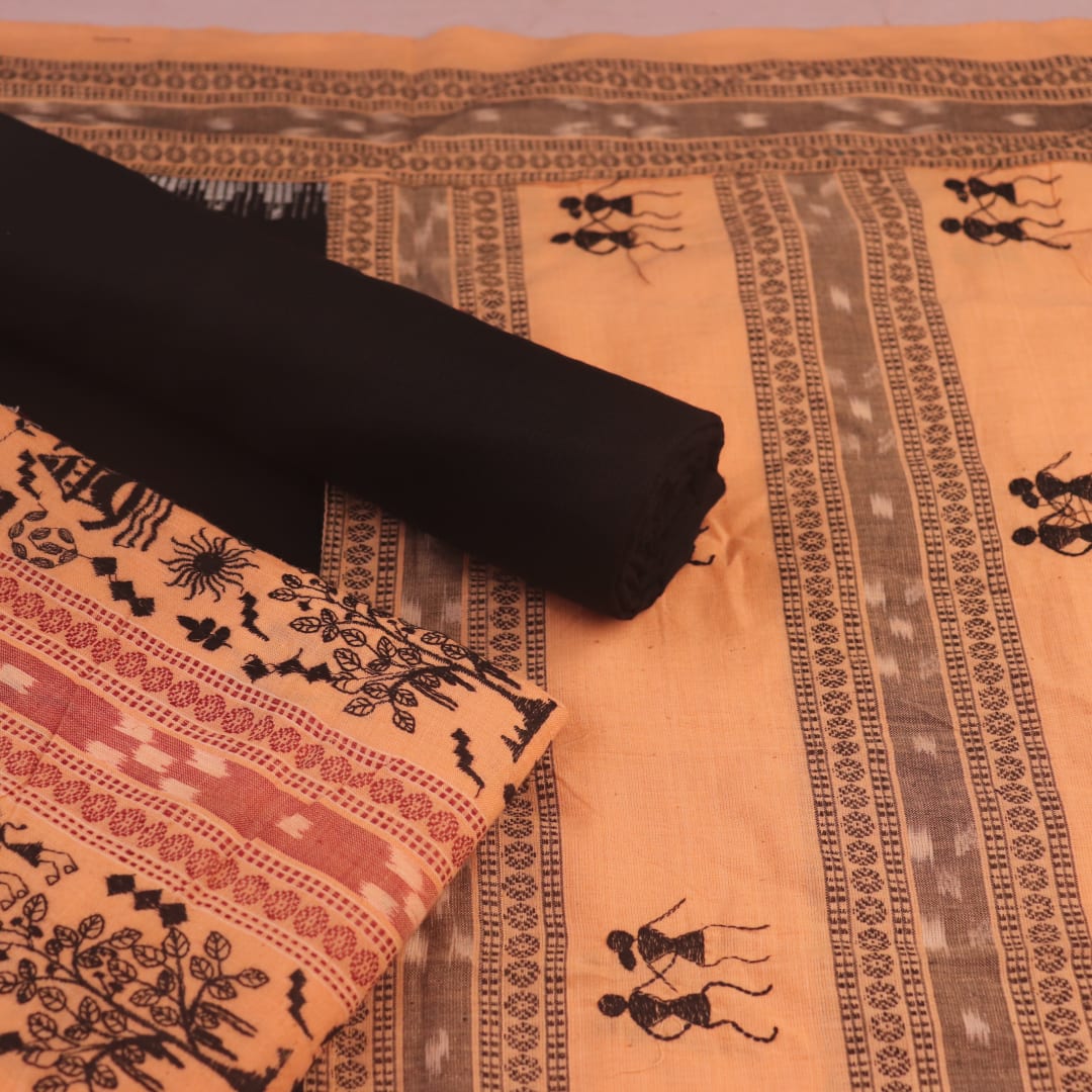 Detail of the Sambalpuri cotton dress material's blouse piece, featuring black and cream motifs.