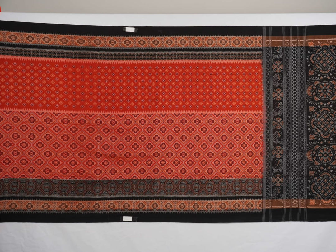 Full layout of the orange and black Sambalpuri cotton saree displaying the complete pattern and design.