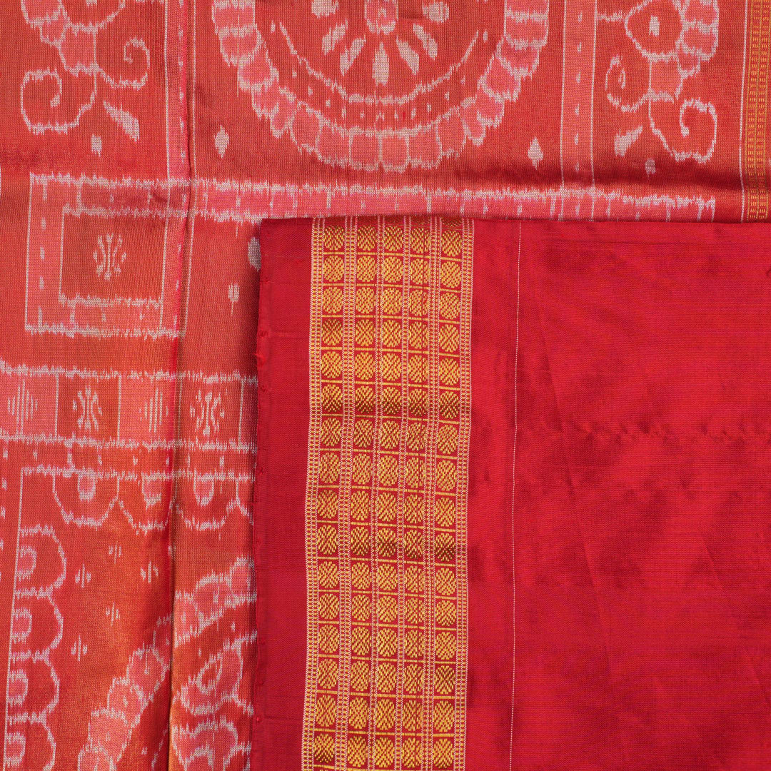 Ultra close-up of Sambalpuri silk saree fabric, showing luxurious texture and tissue motif weave.