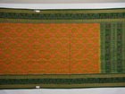 Full flat layout of the green Sambalpuri cotton saree displaying the complete body and pallu motifs