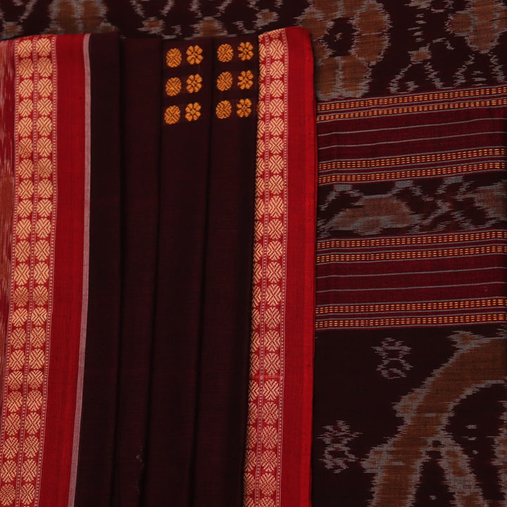 Full view of a maroon cotton Bomkai saree featuring a butta pattern with a red border and pallu.