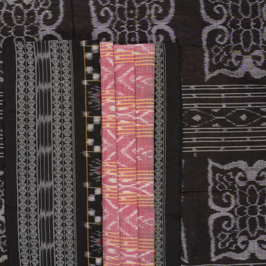 Model wearing a black Sambalpuri cotton saree with multi-color Pasapalli pattern in a full drape.