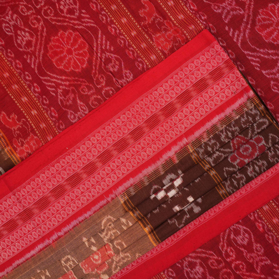Model draped in brown and red Pasapalli Sambalpuri cotton saree showcasing traditional Odisha handloom