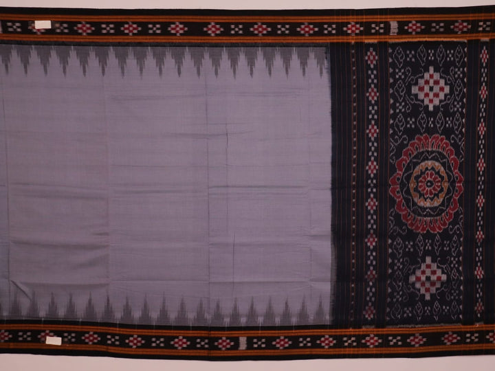 A draped handloom Sambalpuri cotton saree with motifs in grey and black