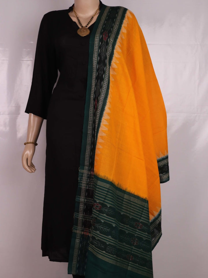 Yellow Sambalpuri cotton dupatta styled with a green blouse piece, draped over a model