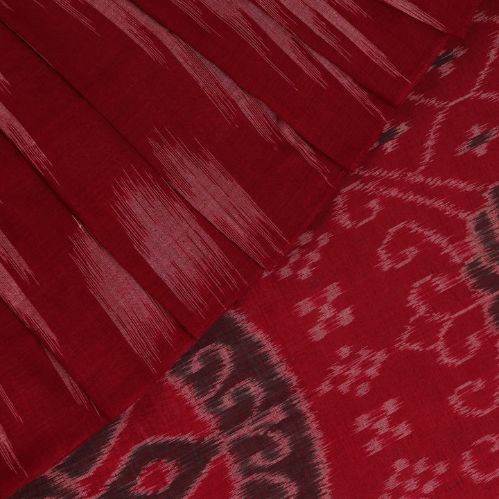 Draped multi-color Sambalpuri cotton saree with maroon highlights and plain body.