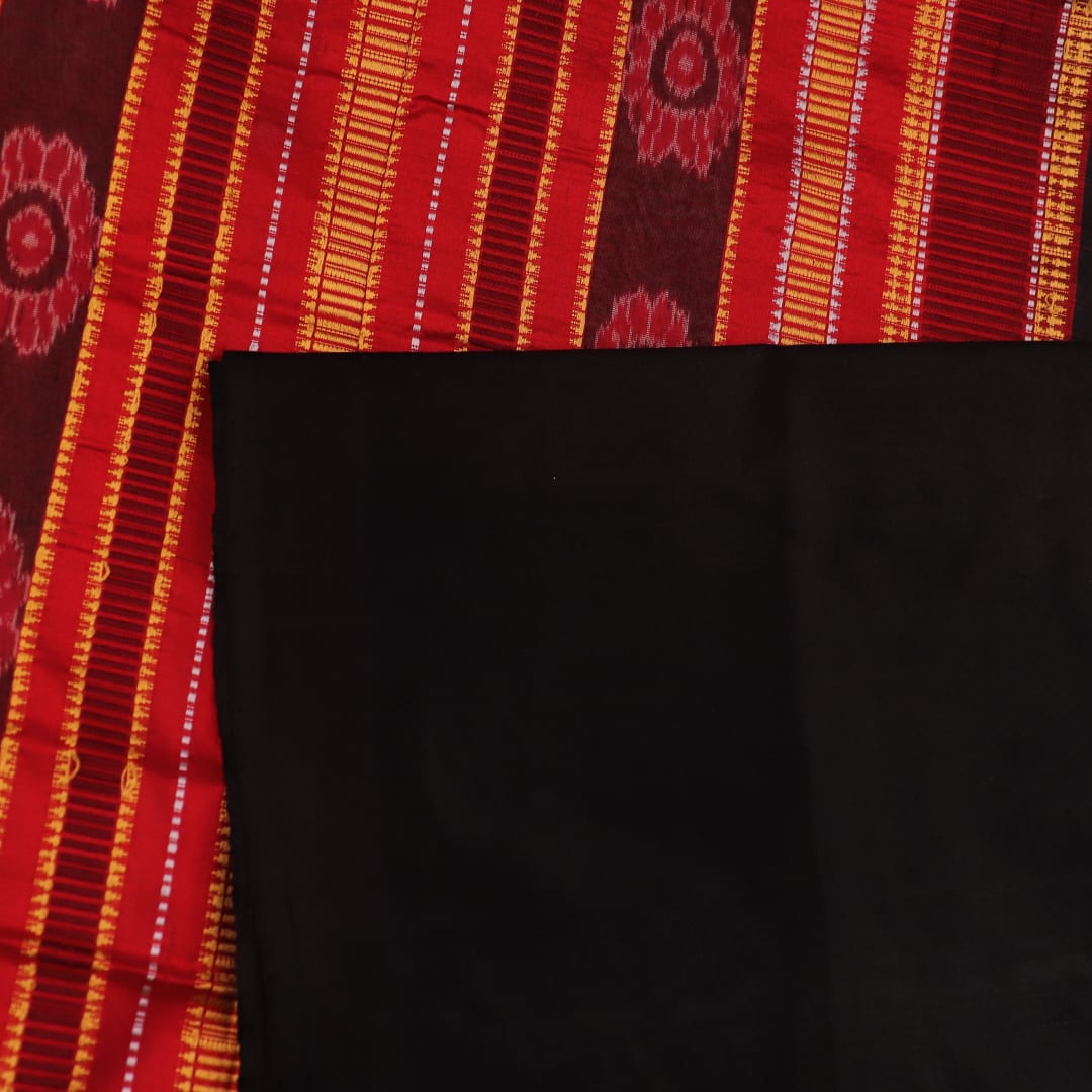 Close-up of grey and red Sambalpuri Silk saree fabric texture, highlighting butta pattern weave.