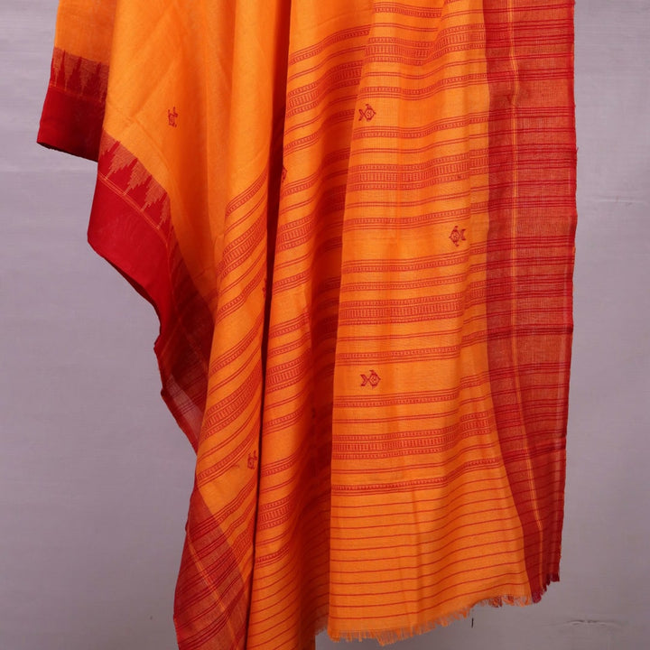 Sambalpuri Cotton Dupatta in Yellow and Red with intricate Butta pattern, styled and draped in an elegant manner