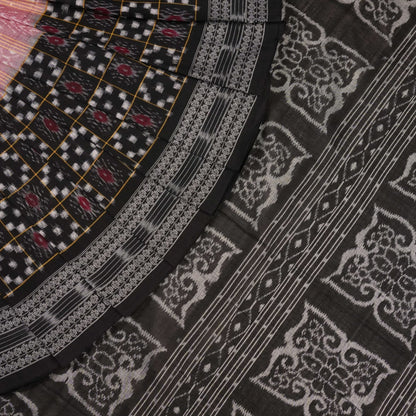 Model wearing a black Sambalpuri cotton saree with multi-color Pasapalli pattern in a full drape.