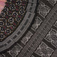 Model wearing a black Sambalpuri cotton saree with multi-color Pasapalli pattern in a full drape.