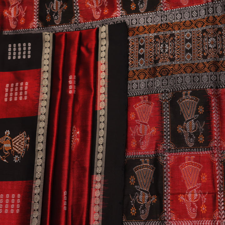 Close-up of maroon silk fabric with delicate butta patterns in black.