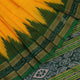 Yellow Khandua silk saree draped, showcasing its simple elegance and the plain body.