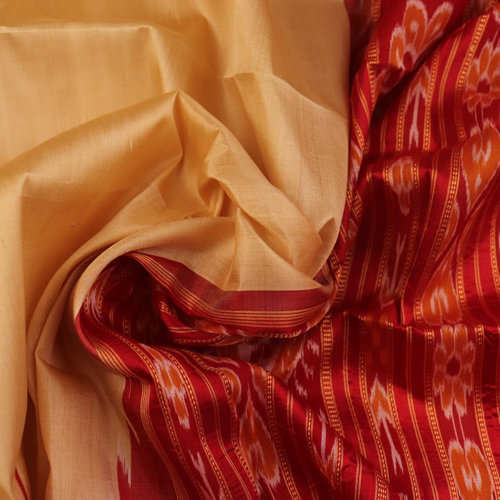 Saree styling: Cream Khandua silk saree with maroon butta pattern draped elegantly.