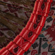 Green and Red Cotton Sambalpuri Saree Draped in a Stylized Manner