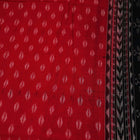 Styling view of a red and black Sambalpuri cotton dupatta with intricate motifs