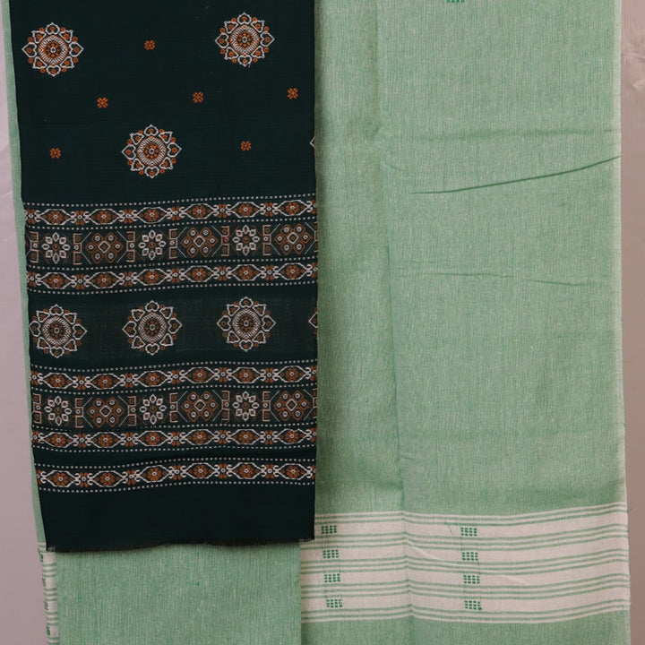 Coordinating green Bomkai cotton blouse piece with subtle weave details.