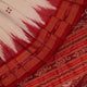 Khandua silk saree styled; white with red butta design, showcasing drape and overall look.