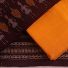 Detail of maroon and yellow Sambalpuri cotton dress material's blouse piece with motifs.