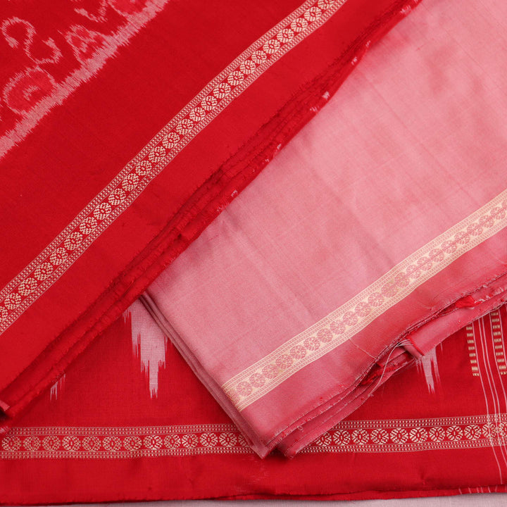 Detail of red and peach Sambalpuri Silk dress material blouse piece with motifs.