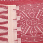 Plain white and maroon Sambalpuri cotton saree styled to show its drape and color combination.