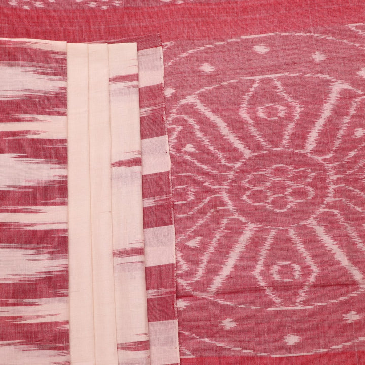 Plain white and maroon Sambalpuri cotton saree styled to show its drape and color combination.