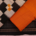 Detail of the white and yellow Sambalpuri cotton dress material blouse piece, showing motifs.