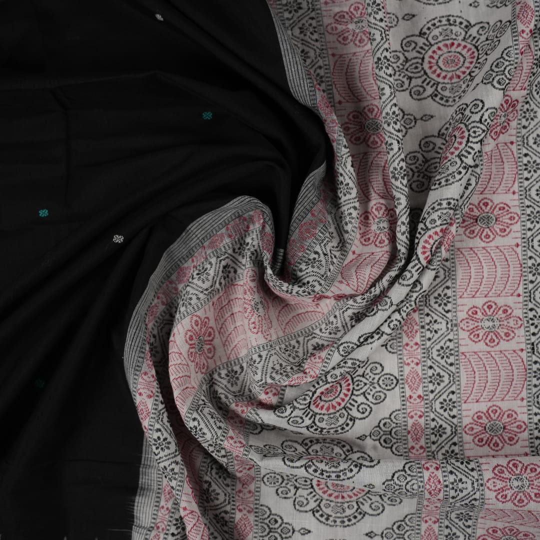 Full view of the black and green Bomkai cotton handloom saree showing the complete body, pallu, and border.