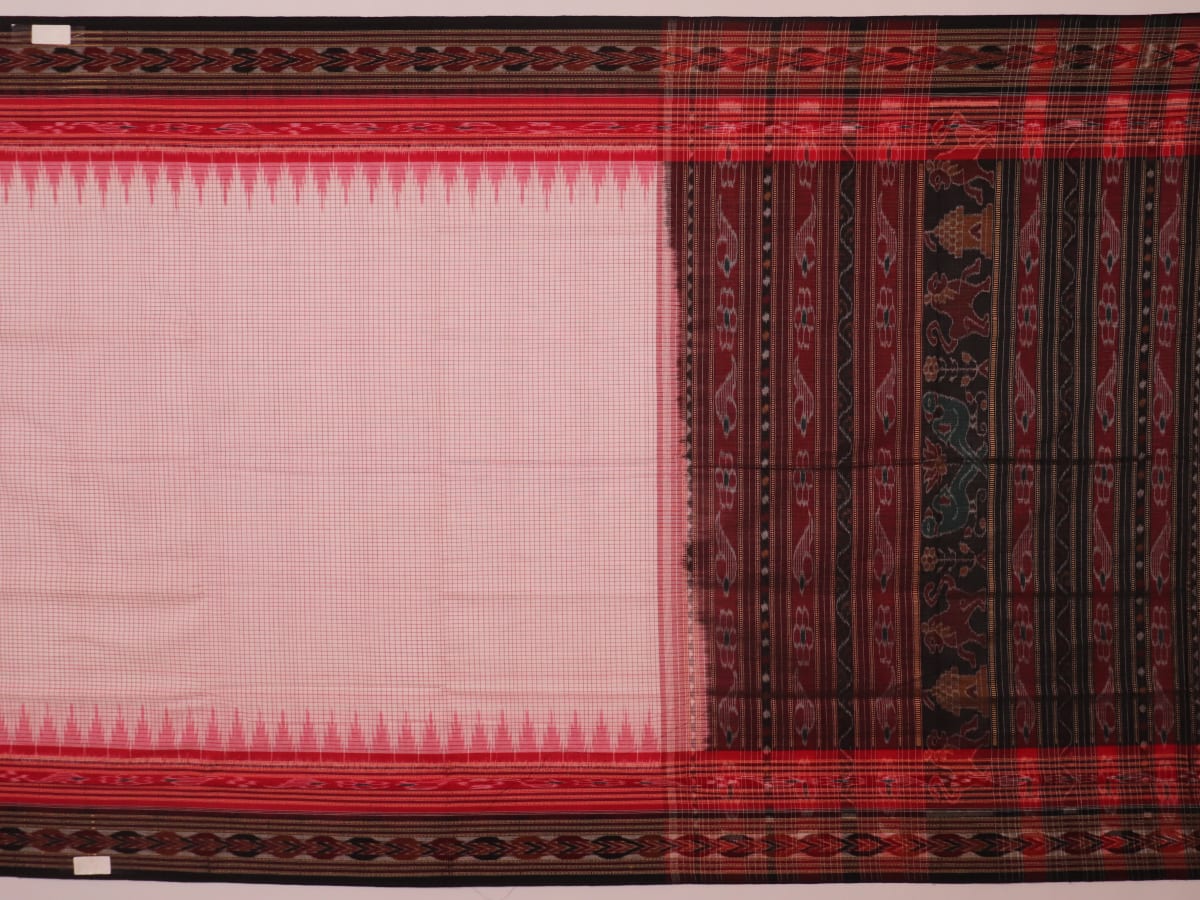 Saree styling: White and black Sambalpuri cotton saree with motifs, draped to showcase the overall look.