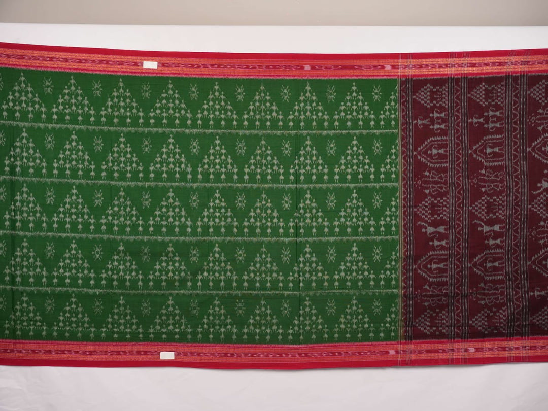 Model draped in a green and red Sambalpuri cotton saree with traditional motifs, styled for a classic look.