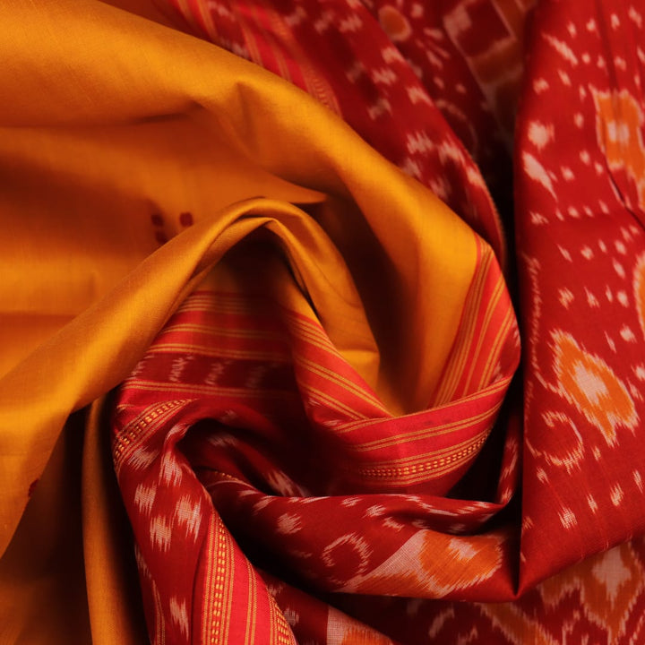 Styled drape view of yellow silk Khandua saree with red butta embroidery