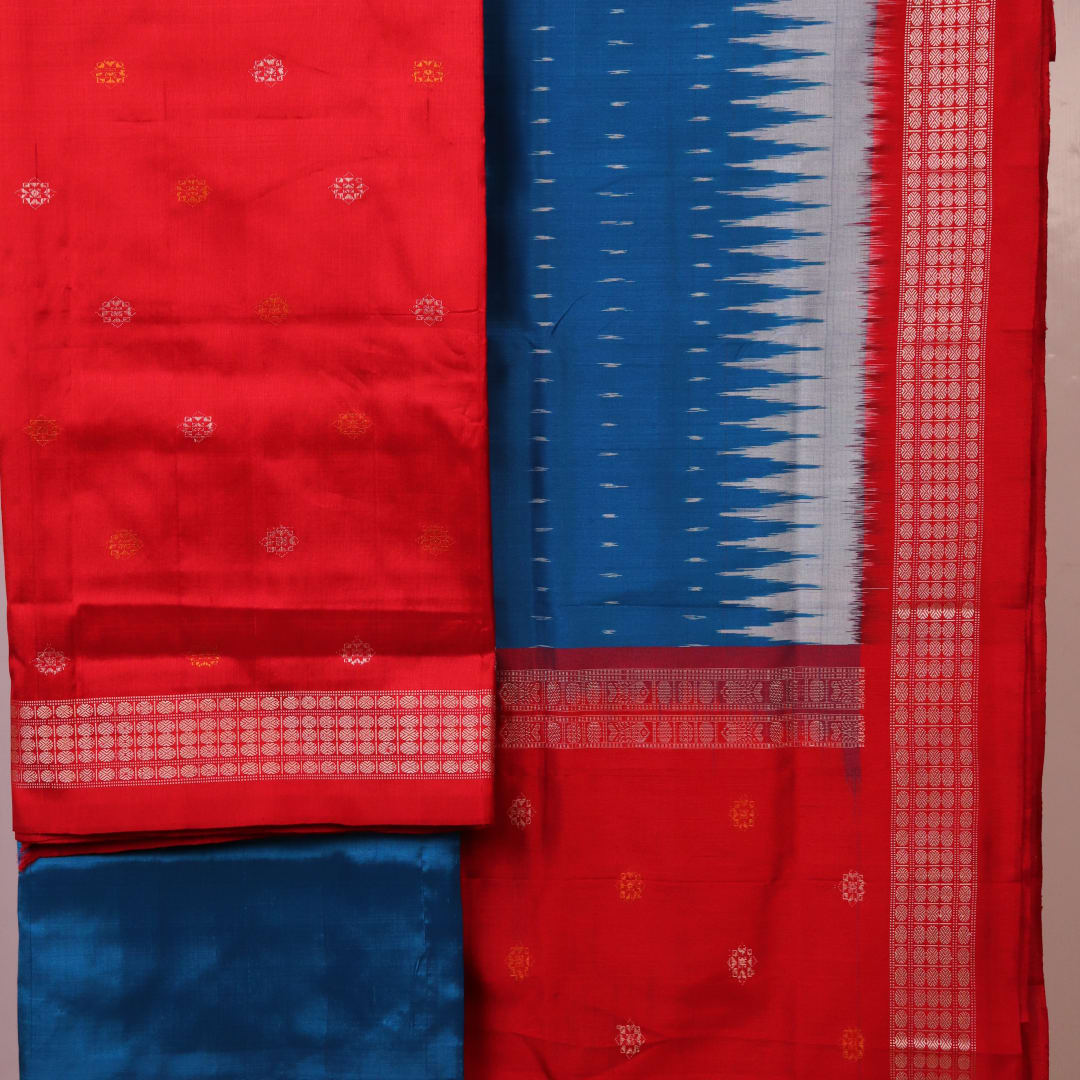 Red and blue Bomkai silk blouse piece with butta pattern.