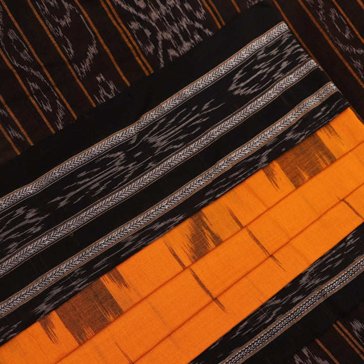 Draped view of a yellow and black Sambalpuri cotton saree with motifs, showcasing its styling and fall.