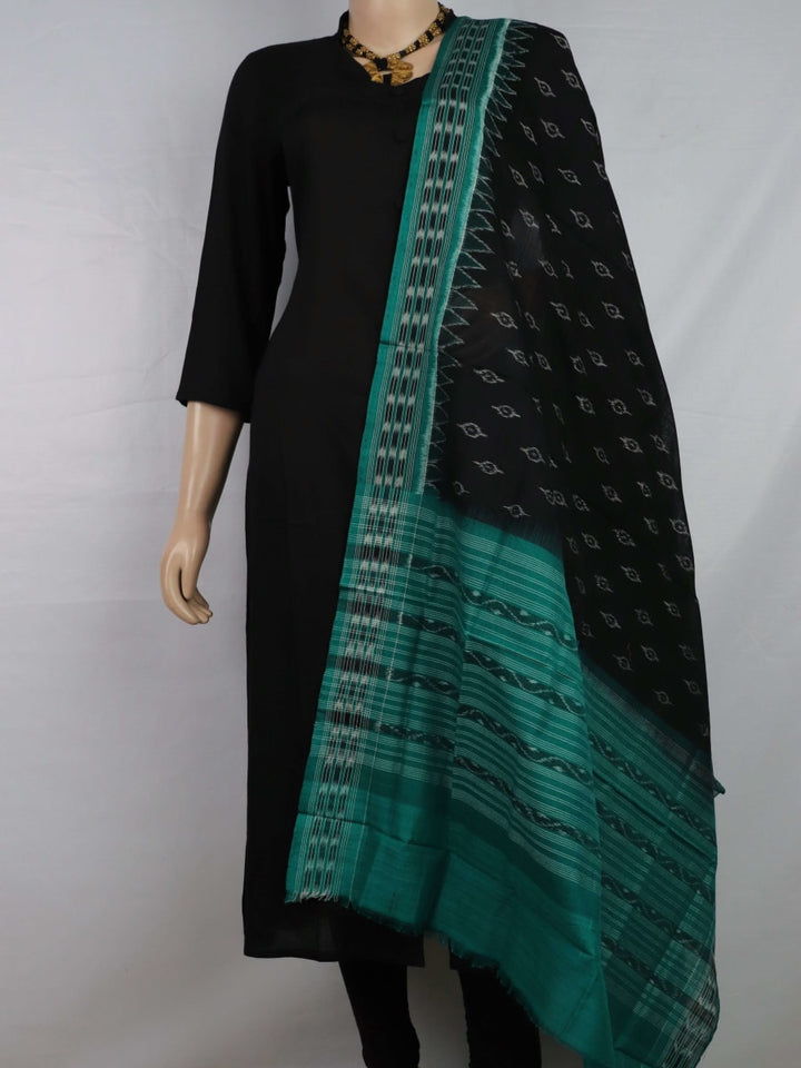 Styling view of a black and green Sambalpuri cotton dupatta with intricate motifs