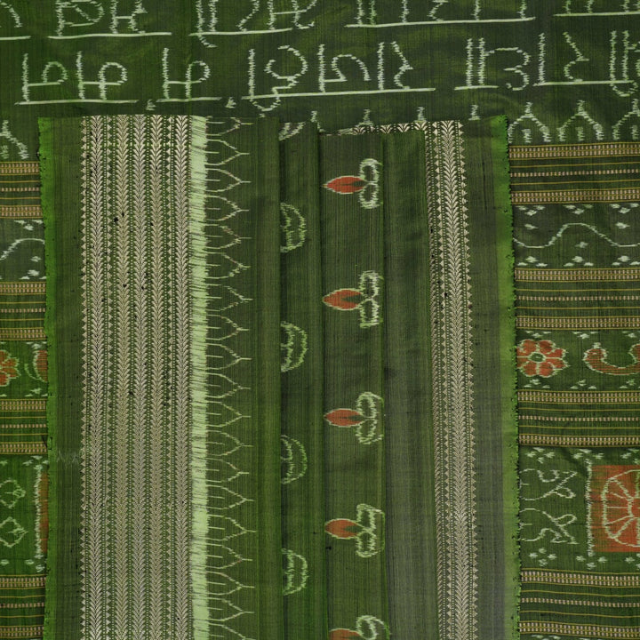 Ultra close-up of green Sambalpuri silk fabric, revealing its unique texture and fine weave.