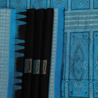 Close-up of Intricate Bomkai Silk Saree Fabric Texture in Black and Blue with Butta Pattern