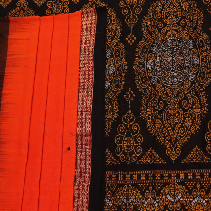 Full view of a Bomkai cotton saree in orange with black butta pattern